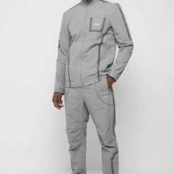 Man Tracksuit Tops Crinkled Nylon Taped Track Jacket - Ice Grey