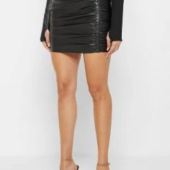 Woman Skirts Vegan Leather Ruched Mini Skirt - Black