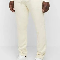 Man Tracksuit Bottoms TRACKSUITS Essential Signature Track Pants - Cream