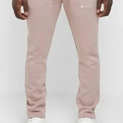 Man Tracksuit Bottoms TRACKSUITS Essential Signature Track Pants- Pink