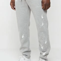 Man Tracksuit Bottoms TRACKSUITS Paint Splatter & Distressed Track Pants - Grey
